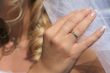 Hand touching a bridal veil