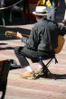 Street musician, guitar