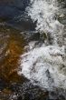 little rapids and spray in a small creek
