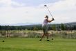 Lady golfer hitting ball from tee