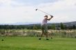 Lady golfer hitting ball from tee
