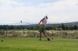 Lady golfer hitting ball from tee