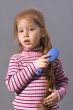 Girl with comb