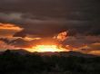  Sunset glowing up thru Rainclouds