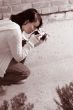 Girl with SLR photo camera