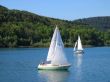 Two little yachts on water