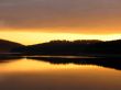 Orange sunset mirrorred in water