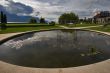 Clouds are reflected in small pool