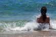 The girl has a rest on a beach