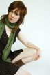 Green dress on the edge of the frame