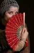 Decadanse with a red fan