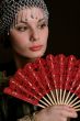 Decadanse with a red fan