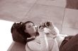 Girl with SLR photo camera