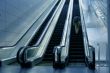Man on escalator