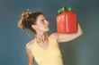 woman looks at petrol can