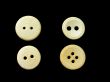 four white buttons