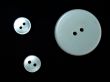 three white buttons