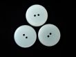 three round white buttons