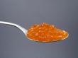 Spoonful of salmon caviar