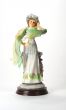 Figurine of a lady with green scarf