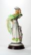 Figurine of a lady with green scarf