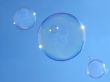 Real soap-bubbles on the blue sky