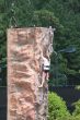 Woman Climbing Wall