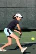 Young girl playing tennis