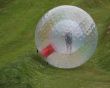 Zorb rolling down a hill