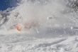 falling snowboarder