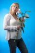 happy pregnant woman with flower