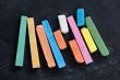blackboard with coloured crayons
