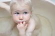 portrait of baby in bath