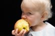 girl bitting apple