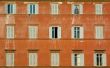 windows of old house, rome, italy