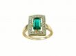 Golden ring with big emerald and diamonds