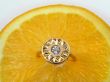 Orange and diamond ring