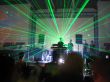 DJ in a view of the green laser