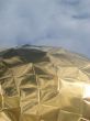 Golden church cupola mirroring surface