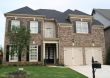 Brown and Tan Brick House