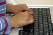 Typing on a Laptop