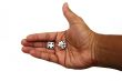 Pair of dice in a hand