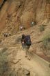 Climbers approaching rock face
