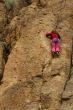 Young woman climbing