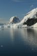 Mountains & glaciers reflected in calm ocean