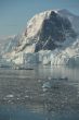Mountains & glaciers reflected in calm ocean