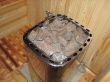 classic wooden dry sauna inside hot stones