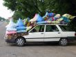 Cars loaded coloured bag on the sidelines