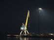 Port crane on the bank
