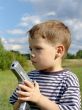 Little boy with toy-pistol